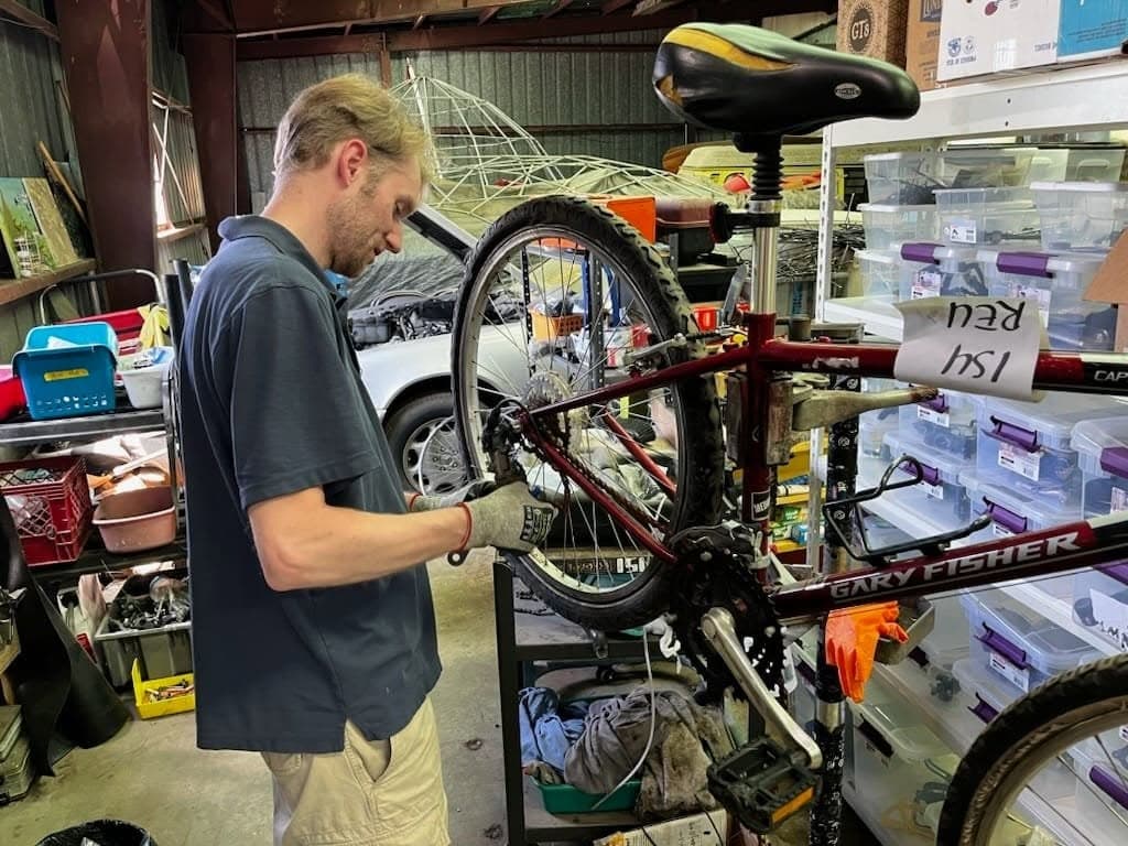 Bike mechanic fixing a road bike